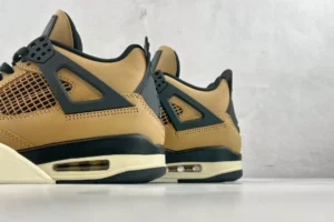Nike Air Jordan 4 Retro Wheat tan black beige nubuck leather sneakers with visible air sole cushioning