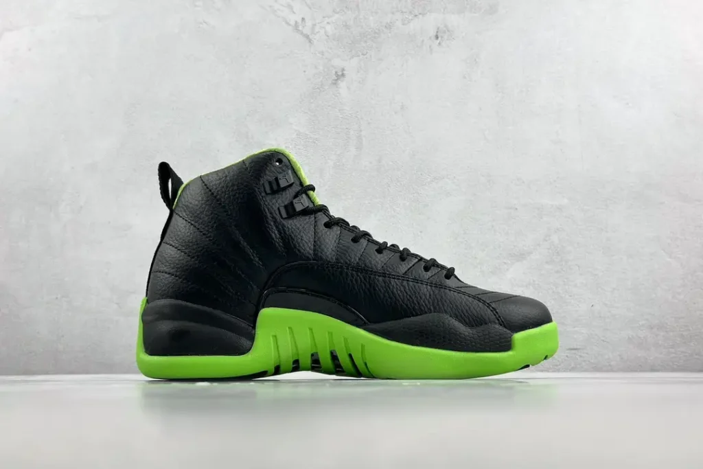 Nike Air Jordan 12 Retro black and green leather sneakers with bright green sole and black upper