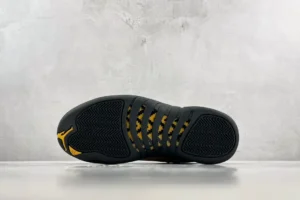 Nike Air Jordan 12 Taxi black yellow outsole rubber sneakers with herringbone traction pattern