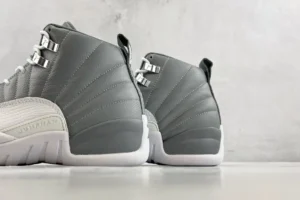 Air Jordan 12 Retro Cool Grey grey white leather sneakers with metal eyelets and rubber sole