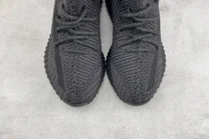 Adidas Yeezy Boost 350 V2 Black colorway black Primeknit sneakers with textured knit upper and rubber sole