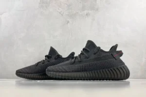 Adidas Yeezy Boost 350 V2 black colorway Primeknit knit sneakers with ribbed rubber sole