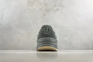 Adidas Yeezy Boost 700 Teal Blue suede mesh sneakers with gum rubber sole from rear view