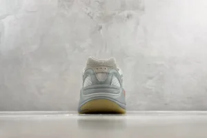 Adidas Yeezy Boost 700 Wave Runner gray white orange mesh leather sneakers viewed from back