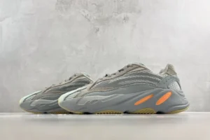 Adidas Yeezy Boost 700 V2 gray green suede mesh sneakers with reflective details and orange midsole accents