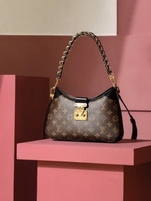 Louis Vuitton Pochette Accessoires 27 M68401 monogram canvas bag with black leather and gold chain handle