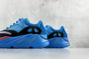Adidas Yeezy Boost 700 Bright Blue black mesh suede sneakers with orange accents and reflective details