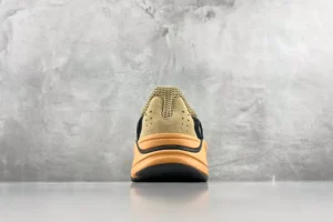 Adidas Yeezy Boost 700 analog tan gum suede mesh sneakers rear view on gray background