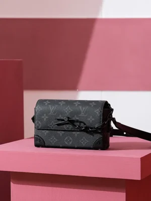 Steamer Wearable Wallet in Monogram Eclipse canvas on a pink display, featuring Louis Vuitton logo and stylish design, suitable for both men and women.