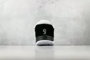 Nike SB Dunk Low Pro black white suede sneakers with embroidered logo on heel and textured sole