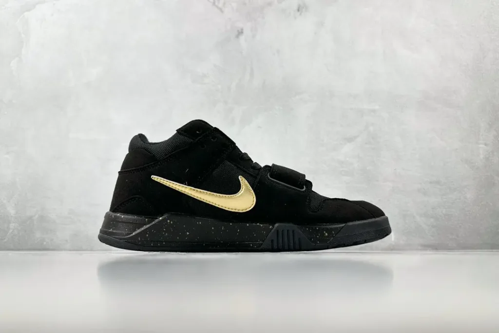 Nike Air Trainer 1 black gold colorway synthetic suede sneakers with speckled sole