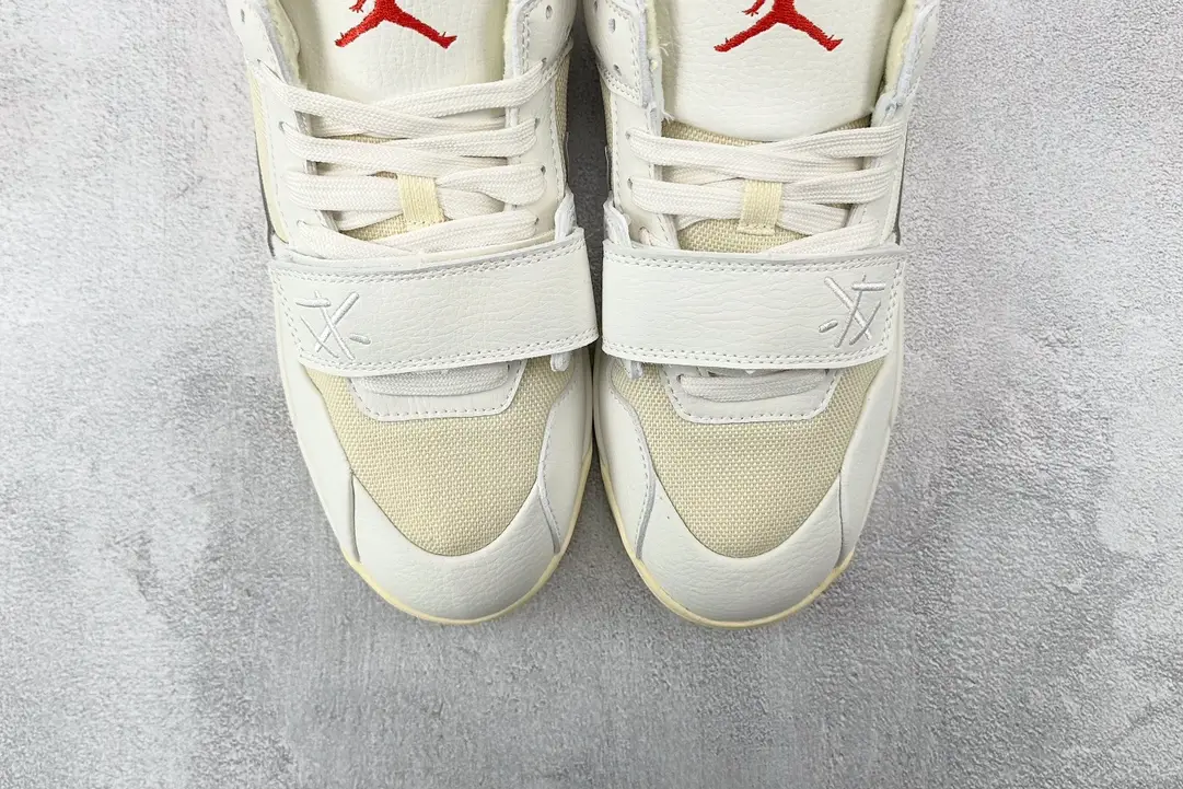 Nike Air Jordan 4 Retro OG white varsity red sail leather sneakers with mesh panels and strap