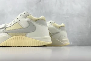 Nike Air Trainer 1 Low grain leather mesh sneakers in beige and white colorway with rubber sole