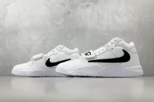 Nike Air Trainer 1 white black leather sneakers with strap detailing and signature swoosh logo