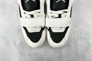 Reebok Question Mid black white colorway leather sneakers with signature foamposite detailing and strap closure