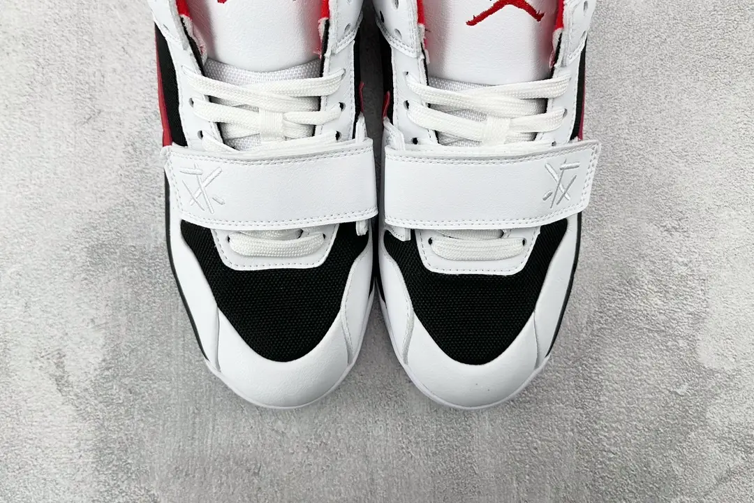 Nike Air Jordan 8 Retro white black red leather sneakers with cross straps and mesh overlays