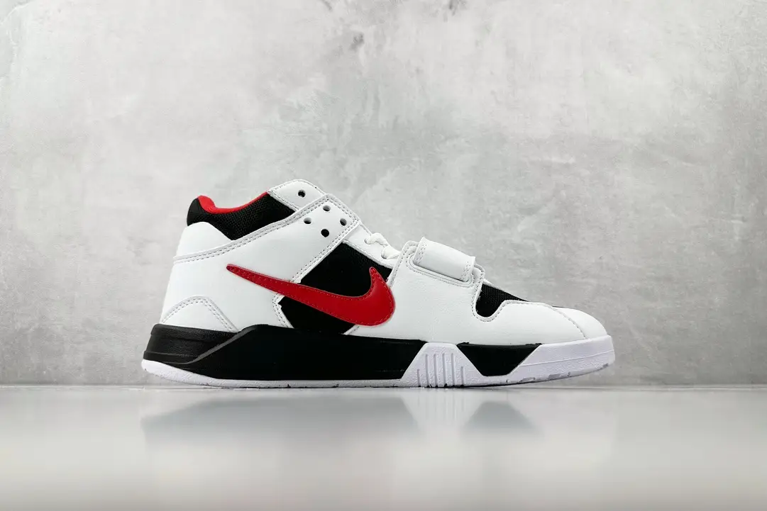 Nike Air Trainer 1 black white red leather sneakers with mid-top design and velcro strap closure