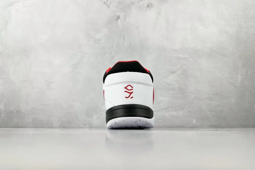 Nike Kobe 1 Protro white red black leather sneakers rear view with signature logo on heel