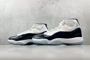 Nike Air Jordan 11 Concord white black patent leather sneakers with icy translucent sole and blue Jumpman logo