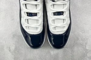 Nike Air Jordan 11 Concord white navy blue patent leather sneakers with mesh upper and translucent outsole