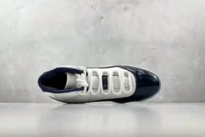 Nike Air Jordan 11 Retro Concord white navy blue patent leather sneakers top view