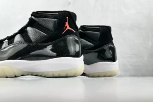 Nike Air Jordan 11 Retro Bred black red white patent leather sneakers with translucent sole