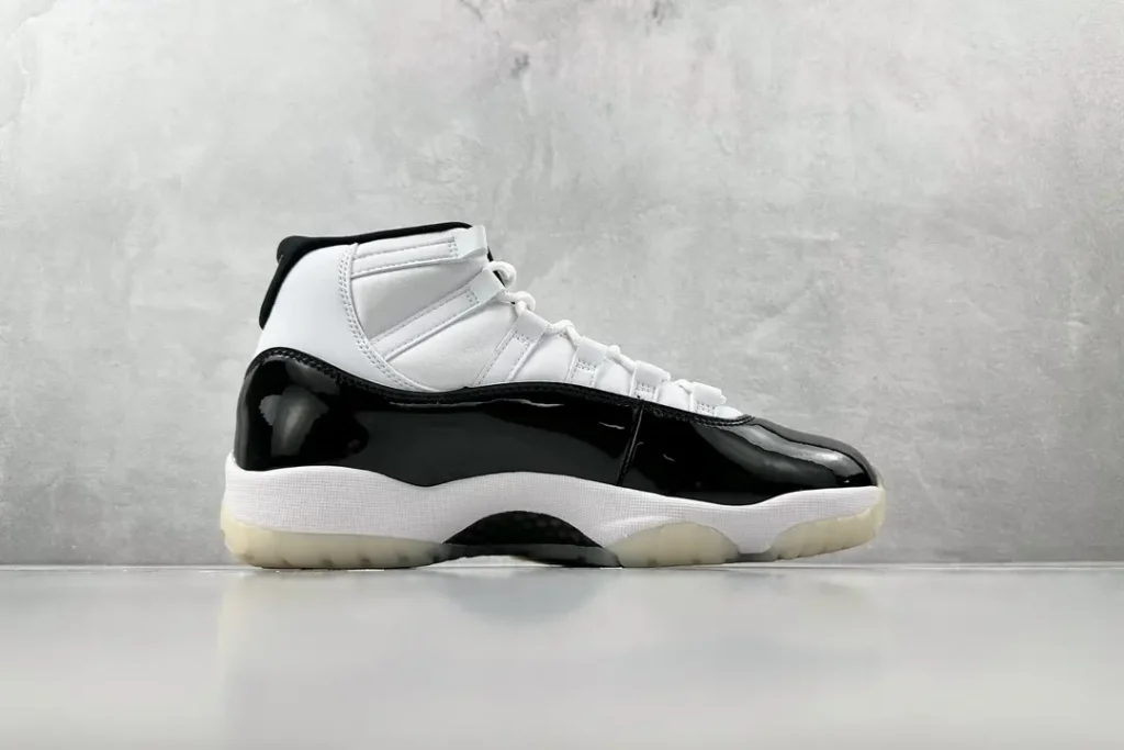 Nike Air Jordan 11 Concord white black patent leather sneakers with translucent sole