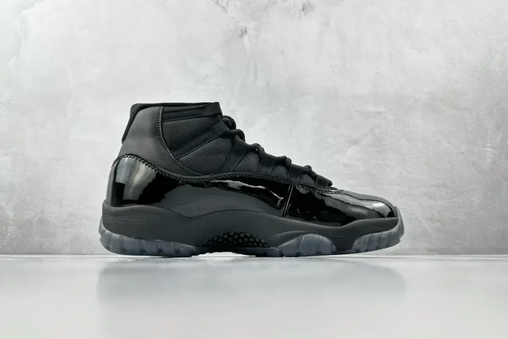 Nike Air Jordan 11 Retro Space Jam black colorway patent leather sneakers
