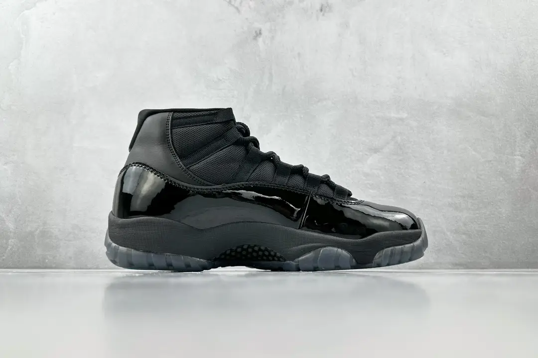 Nike Air Jordan 11 Retro Space Jam black colorway patent leather sneakers