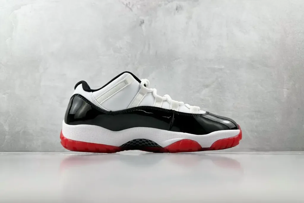 Nike Air Jordan 11 Low Concord black white red patent leather sneakers