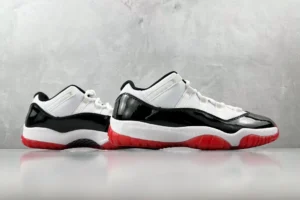 Nike Air Jordan 11 Low Concord Bred white black red patent leather sneakers