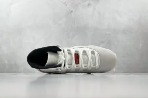 Nike Air Jordan 11 Retro Platinum Tint white black red patent leather sneakers