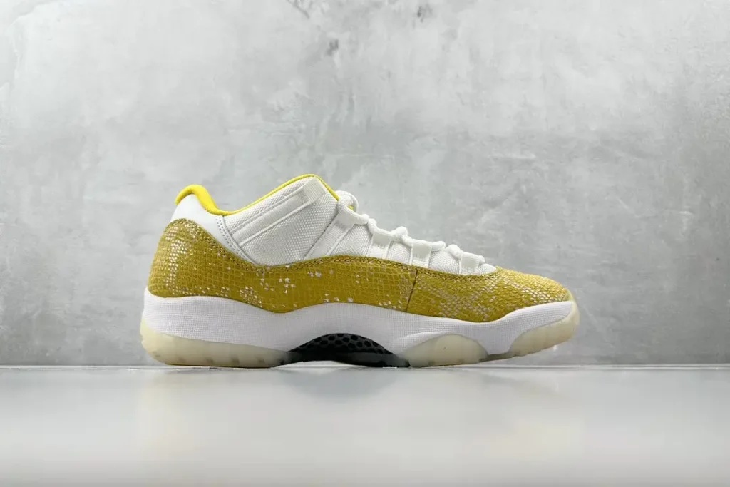 Air Jordan 11 Low Snakeskin white yellow snakeskin leather sneakers