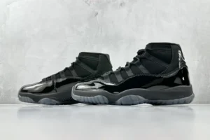 Nike Air Jordan 11 Retro 378037-011 black patent leather sneakers with mesh upper and translucent sole