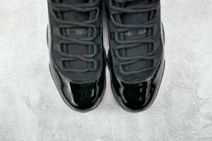 Nike Air Jordan 11 Retro Cap and Gown black patent leather sneakers with mesh and rope laces