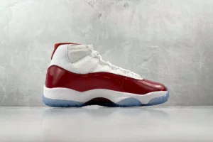 Nike Air Jordan 11 Retro Cherry varsity red white patent leather sneakers with translucent sole