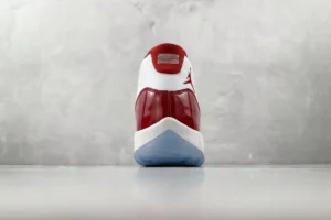Nike Air Jordan 11 Retro Cherry red white patent leather sneakers with translucent rubber sole