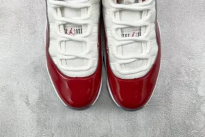 Nike Air Jordan 11 Retro Cherry white red patent leather sneakers with mesh detailing