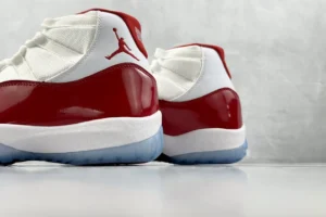 Nike Air Jordan 11 Retro Cherry 2022 white red patent leather sneakers with icy sole