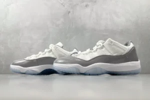 Nike Air Jordan 11 Low Cool Grey white and grey patent leather sneakers with translucent sole