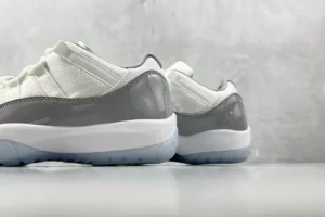 Nike Air Jordan 11 Low Cool Grey white grey patent leather sneakers with translucent sole