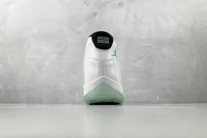 Nike Air Jordan 11 Retro Legend Blue white blue patent leather sneakers viewed from heel