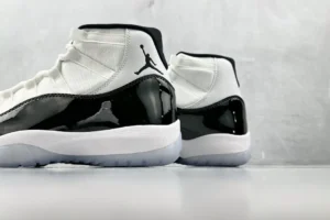 Nike Air Jordan 11 Retro Concord white black patent leather sneakers with icy translucent sole