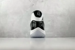Nike Air Jordan 11 Concord white black patent leather basketball sneakers rear view