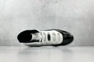 Nike Air Jordan 11 Concord white black patent leather sneakers with mesh upper and high-top design