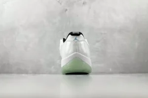 Nike Air Jordan 11 Retro Low Legend Blue white legend blue patent leather sneakers back view