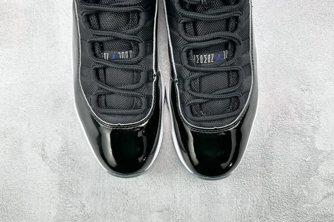 Nike Air Jordan 11 Retro Concord black white patent leather sneakers with mesh upper