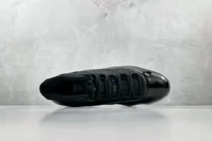 Nike Air Jordan 11 Retro Cap and Gown black colorway patent leather sneakers top view