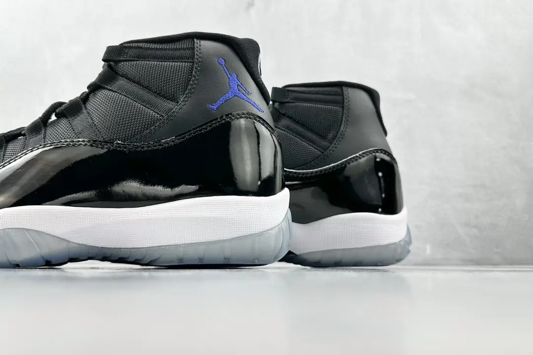 Nike Air Jordan 11 Concord black white blue patent leather sneakers with translucent sole
