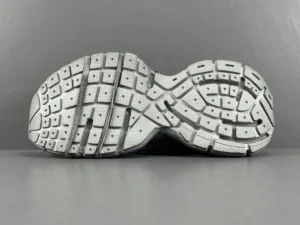 Sole of Silver Grey Balenciaga 3XL Mesh Strap sneakers showcasing intricate tread design and premium craftsmanship.